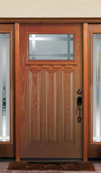 Brown fiberglass door with sidelites