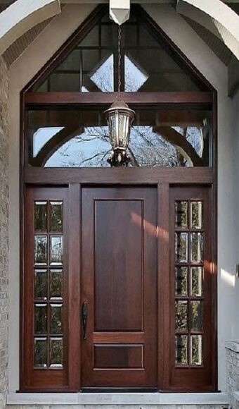 Brown fiberglass door with sidelites and transom