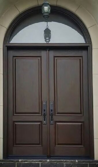 Brown fiberglass double door with transom