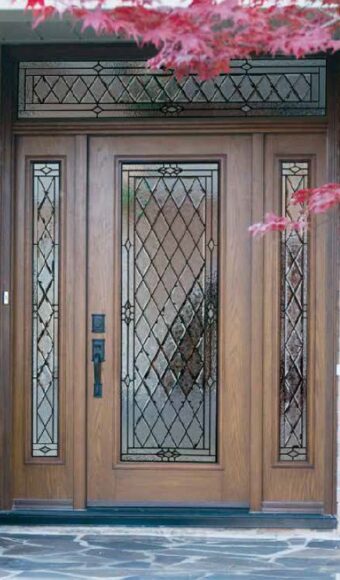 Brown glass entry door with sidelites and transom