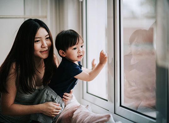 family enjoying their new replacement windows