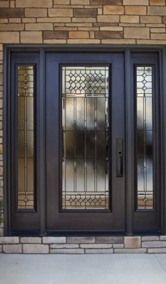 Brown fiberglass front door with sidelites
