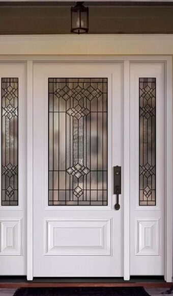 White steel entry door with glass insert and sidelites
